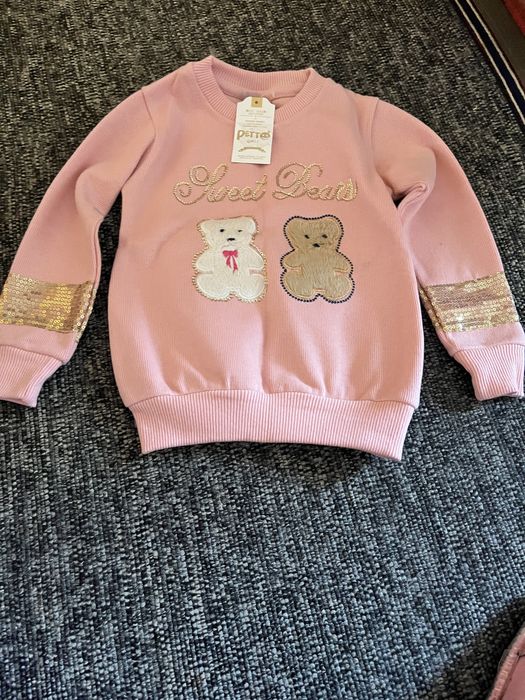 Світерки на дівчинку