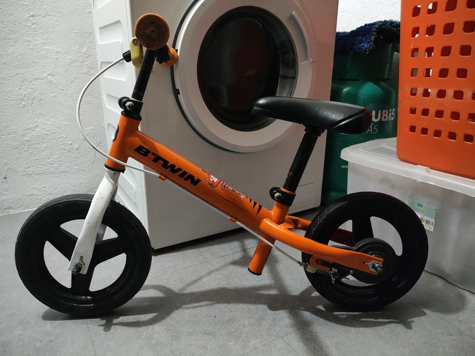 Bicicleta sem pedais criança 10 polegadas RUNRIDE 500 B'TWIN Laranja