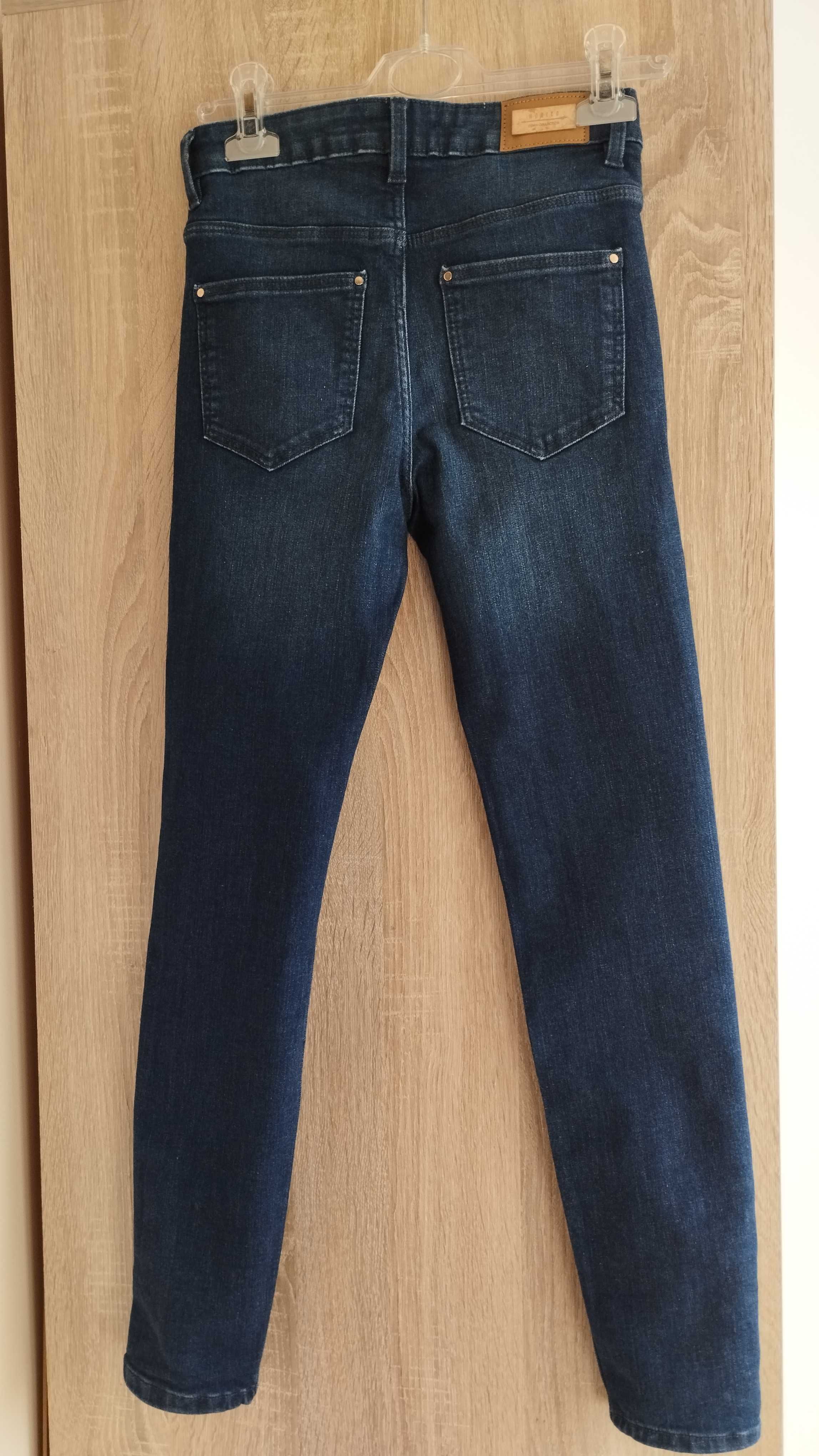 Spodnie jeansowe damskie Mohito - rozmiar 32