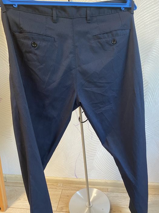 Брюки темно синие в мелкую клетку на мужчину или подростка