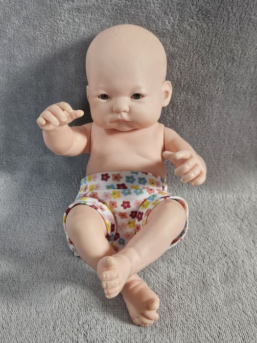 Lalka bobas Miniland 23 cm w stylu reborn dzidziuś