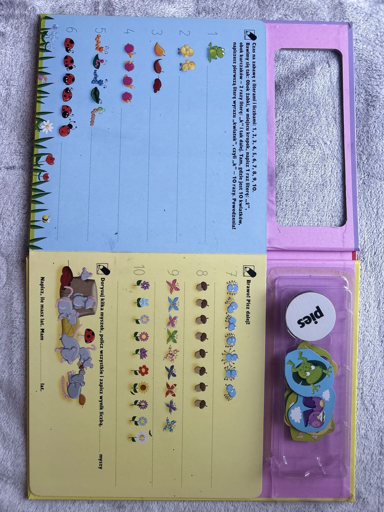 2 Ksiazki: 1 z magnesami i miasto zagubionych rzeczy szukaj znajdz