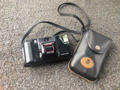 Aparat fotograficzny analogowy Minolta FS-E III.