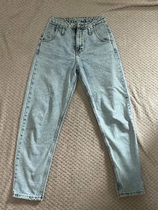 Жіночі блакитні джинси 32 розмір
