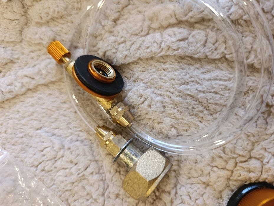 Переходник для зарядки цанговых баллонов.