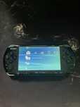Konsola Sony Playstation Portable slim 3004 PSP + 4 gry UMD