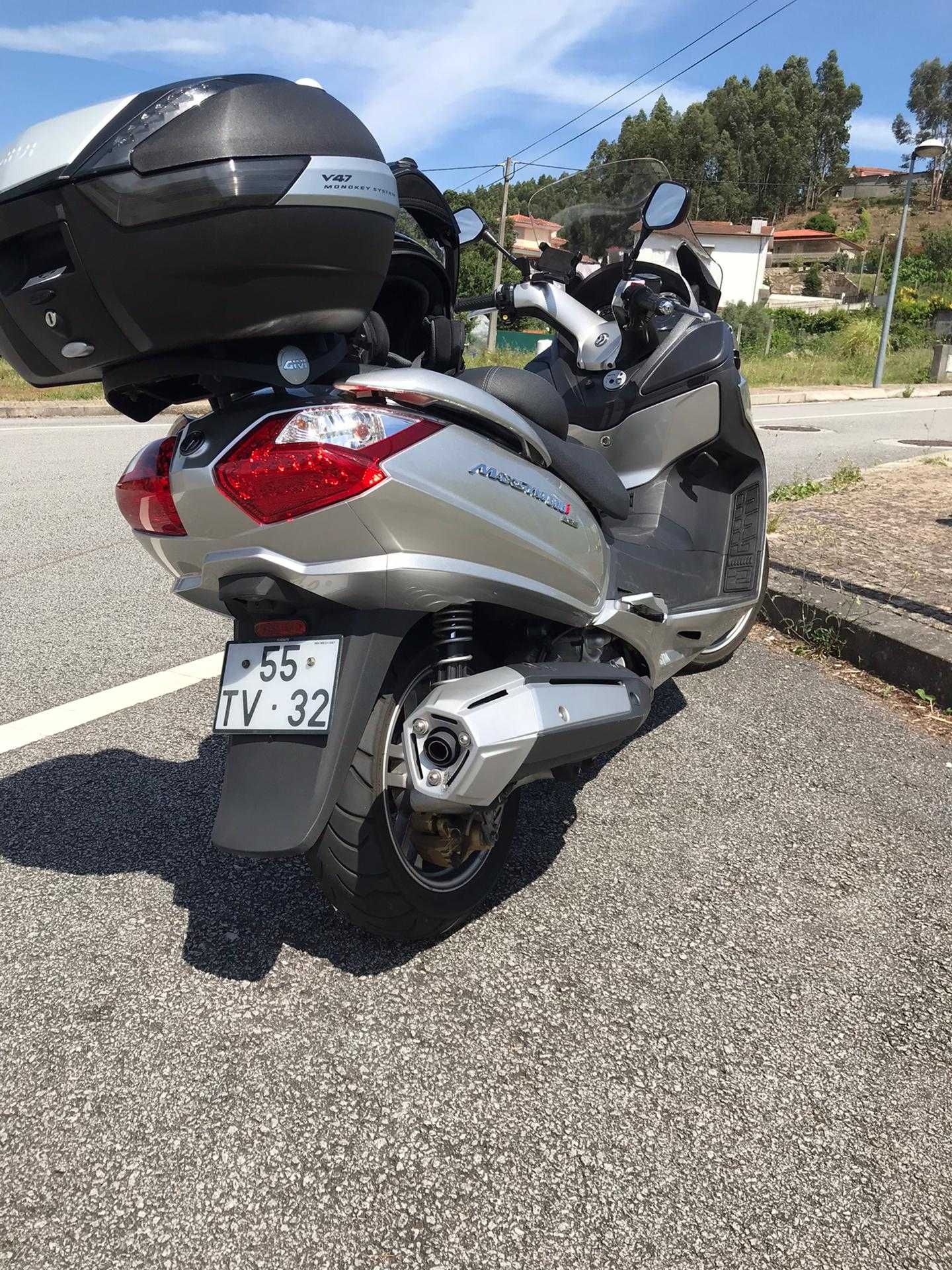 Maxi SYM 600I com abs. Moto igual a novo.