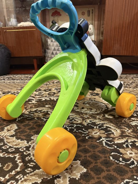 Ходунки-толкатор,розвиваючий, музичний центр Fisher-price