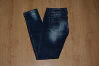 Nowe modne spodnie jeansy biodrówki skinny cieniowane z przetarciami