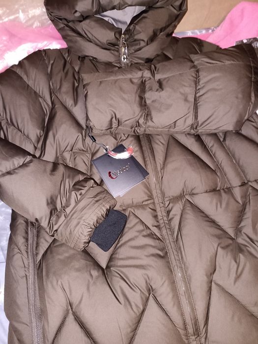 Продам нову зимову куртку 52р