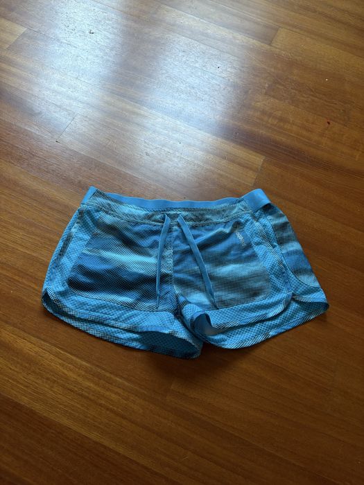 Niebieskie, krótkie spodenki sportowe (shorty) marki Reebok