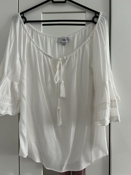 Bluzka boho biała z frędzlami szeroki rękaw XS S Zebra