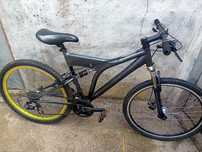 Bicicleta doble suspensão 26