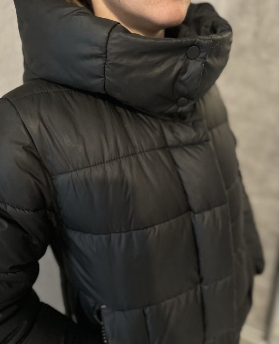 Жіночий довгий пуховик