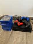 PlayStation 4 Pro 1 ТБ с тремя джойстиками + много дисков