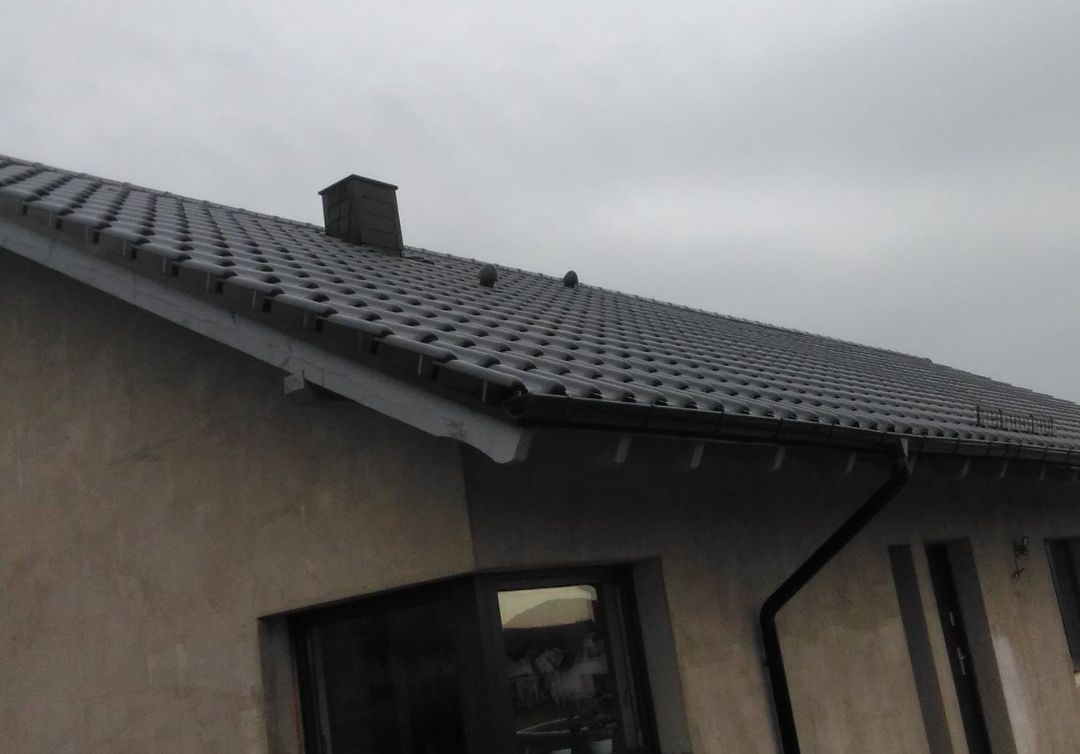 Budowa domów w stanie surowym. Konstrukcje dachowe.