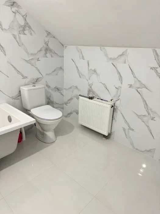 просторий будинок 228 м² з цокольним поверхом та  ділянкою 23 сотки