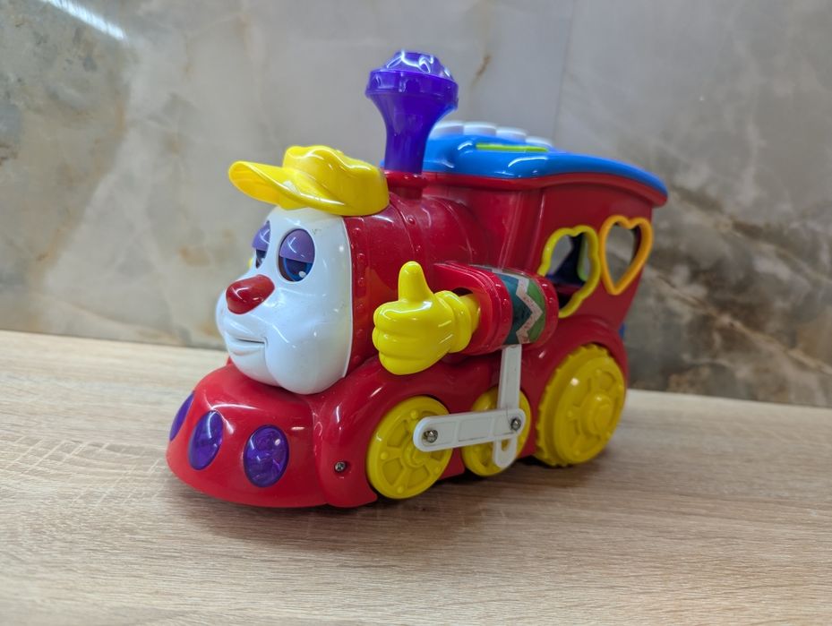 Музична іграшка Hola Toys Паровозик-сортер, що світиться, піан