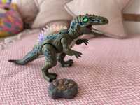 Іграшка динозавр на пульті управління