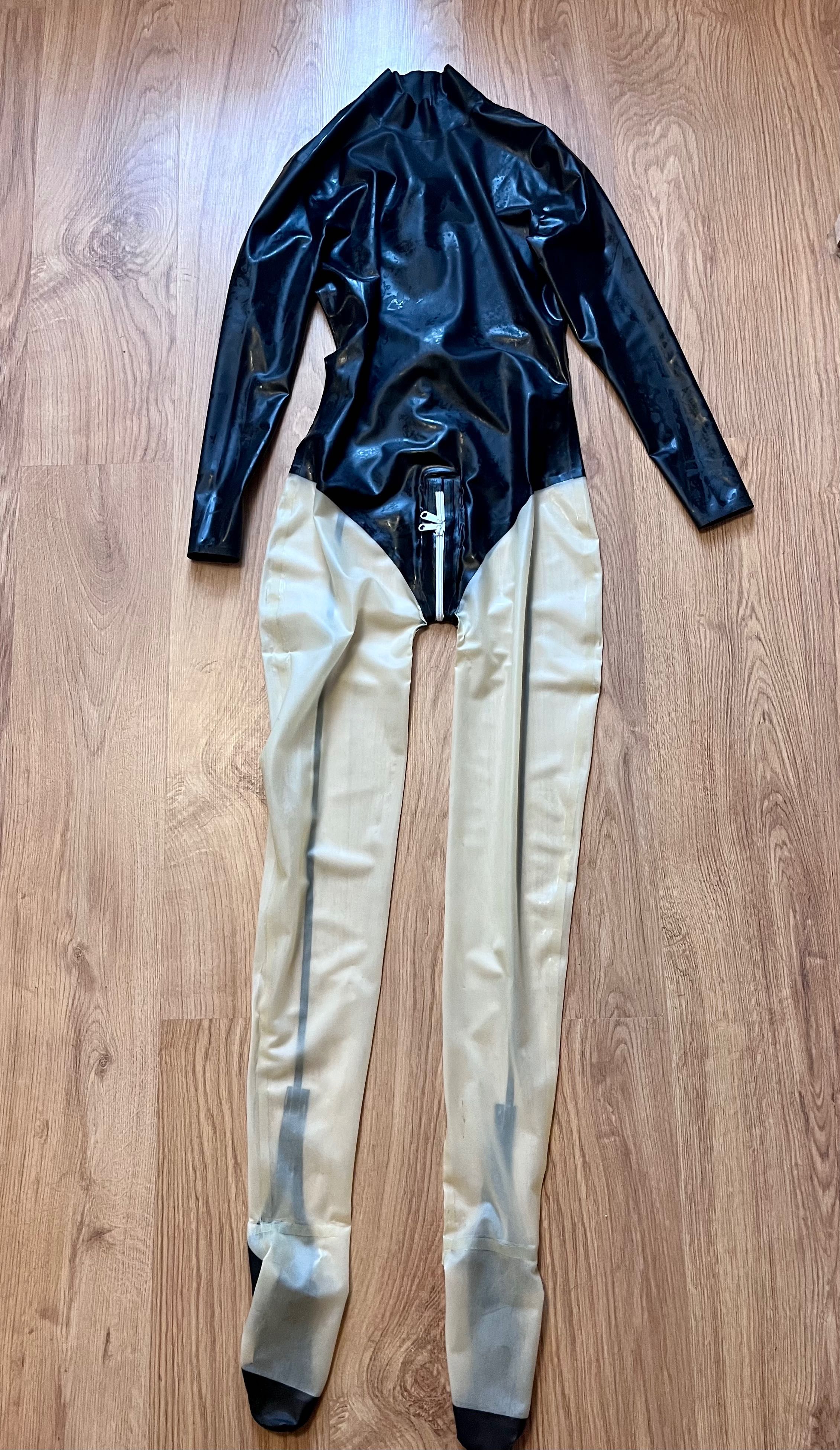 792/ OD RĘKI Kombinezon latex lateks catsuit czarno transparentny M