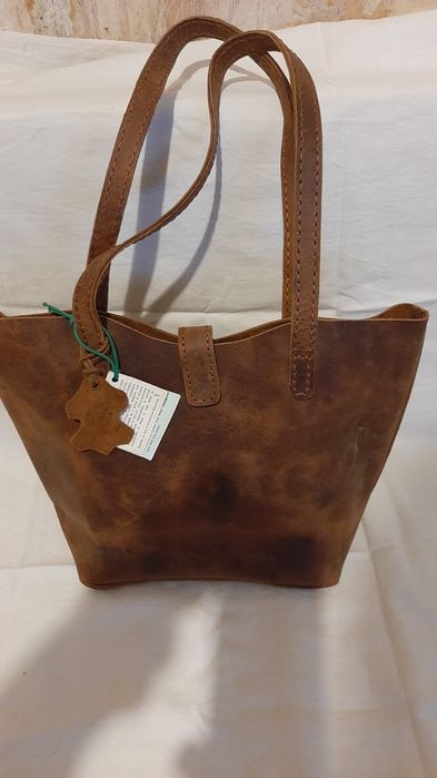 Шикарная сумка их натуральной кожи, новая с внутренним карманом