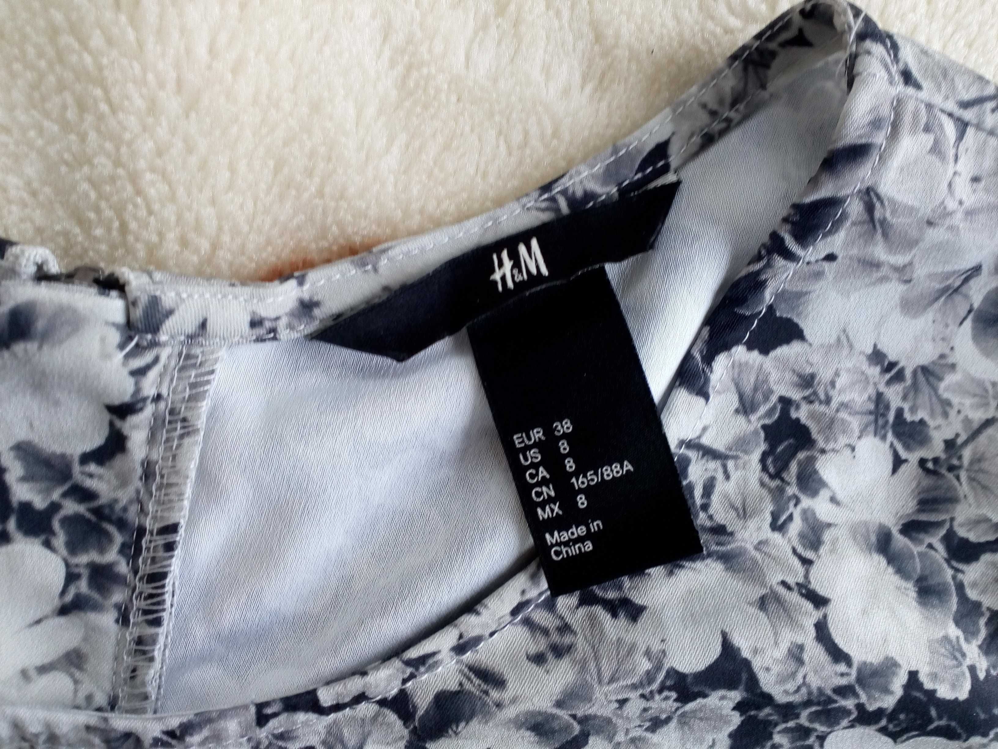 Szara elegancka bluzka z baskinką H&M 38 w kwiatki baskinka jak nowa