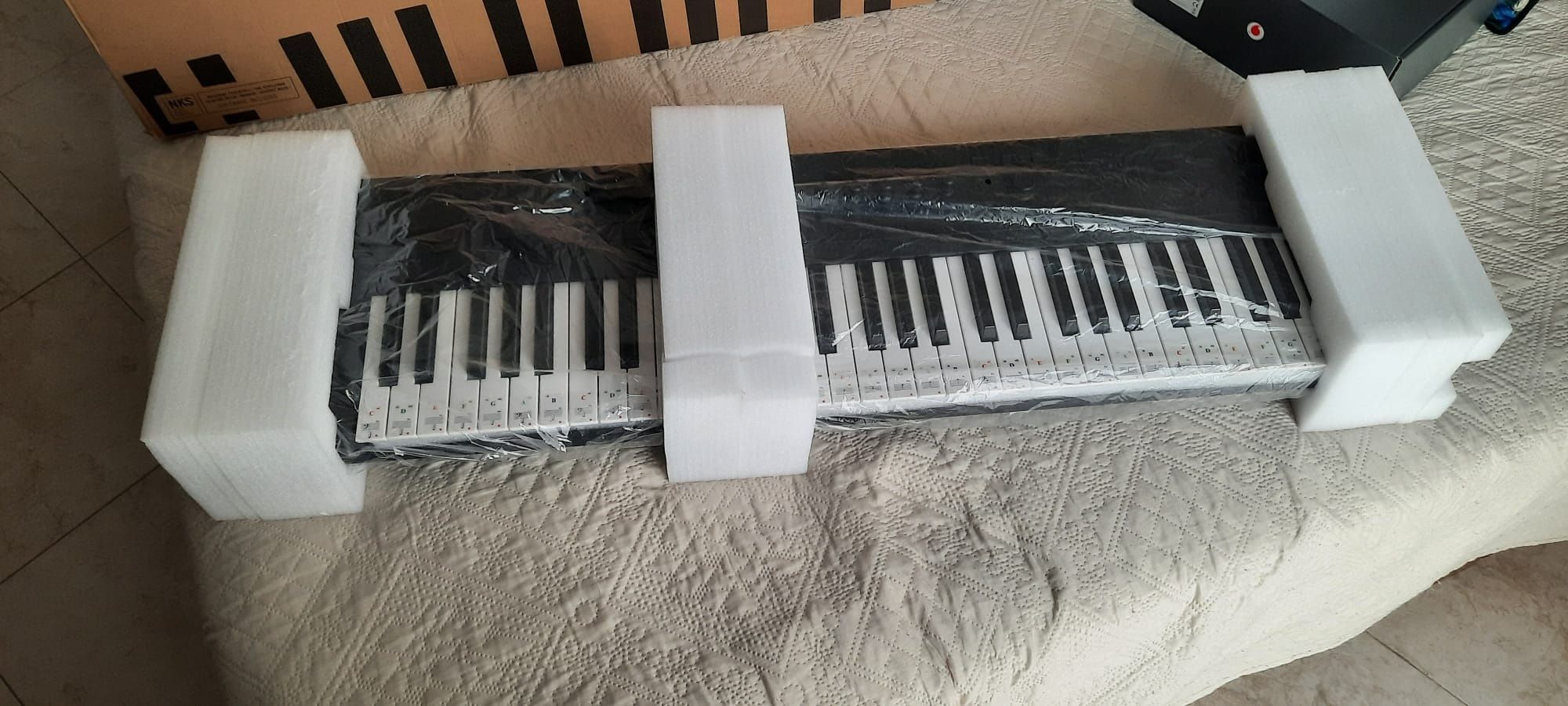 Komplete kontrol a61 teclado piano