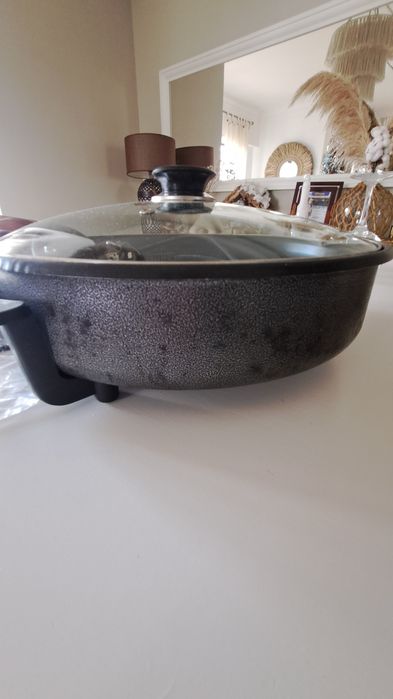 Cloche, panela elétrica