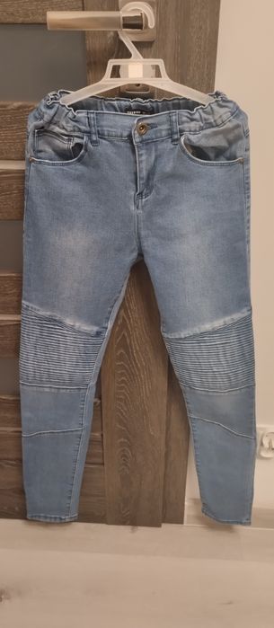 Jeansy damskie Reserved