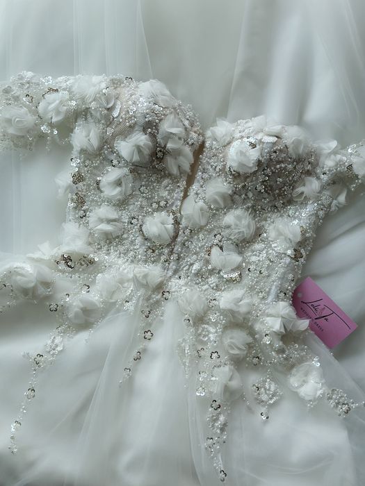 Nowiutka przepiękna sukienka ślubna