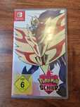 Gra Pokémon Shield na konsolę Nintendo Switch (Pudełko w wersji niem.)