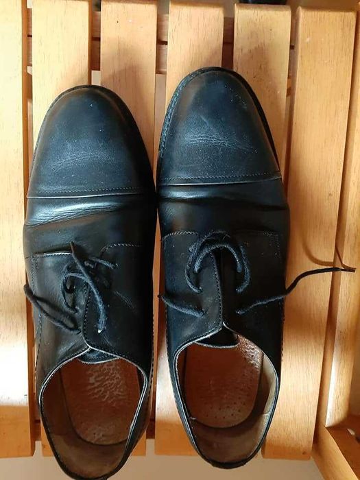 Sapatos de homem em couro