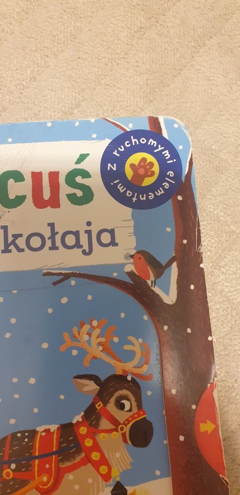 Książeczka Miś Pracuś z ruchomymi elementami Pomocnik Mikołaja Davies