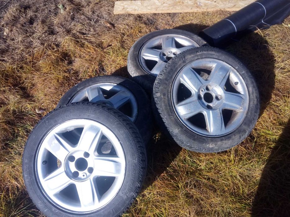 Koła opony zimowe alusy 185/55R15 felgi  rozstaw śrub 4x100