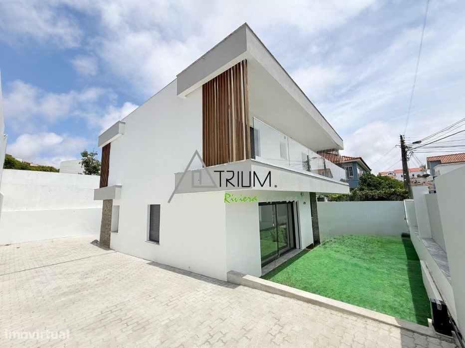 Moradia isolada T3, nova, com jardim.