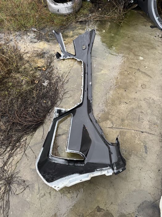 Передний бампер Nissan Rogue T33 дорест левая часть