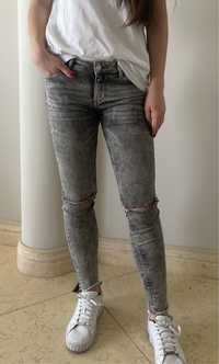 Szare dopasowane sprane jeansy Zara
