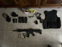 Arma airsoft Lancer Tactical LT12 e material
