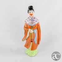 Figura porcelana da China de uma Mulher chinesa