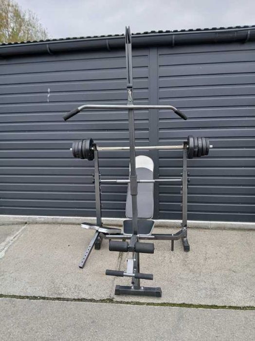 Ławka treningowa z wyciągiem i sztanga .