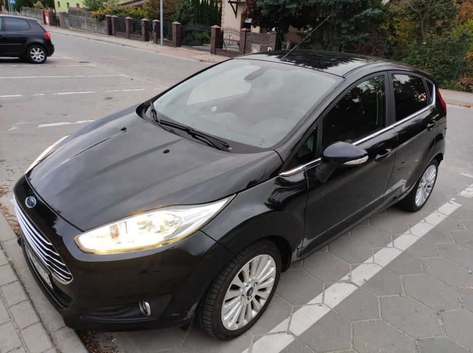 Ford Fiesta Auto w b. dobrym stanie, Klima, Podgrzewane fotele, Alu,Niski przebieg