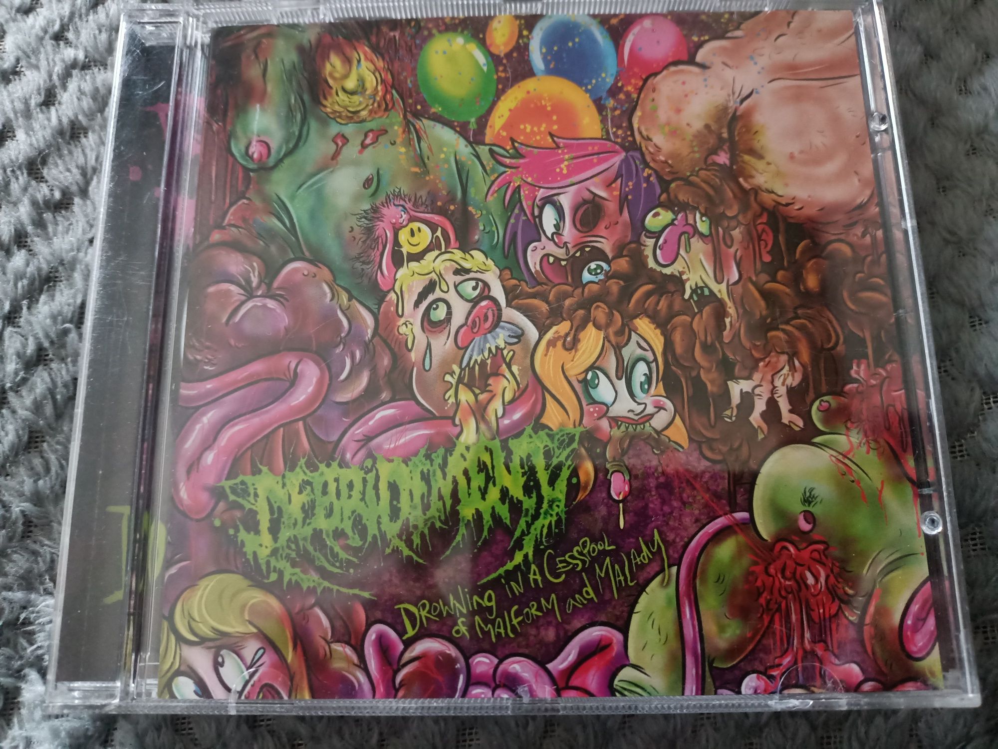 Debridement - Drowning In A Cesspool Of Malform And Malady (CD, Album)