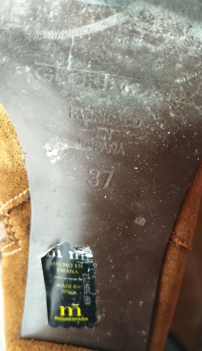 Botas em pele de mulher
