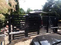 Brama harmonijkowa, brama łamana, mechanizm bramy harmonijkowej