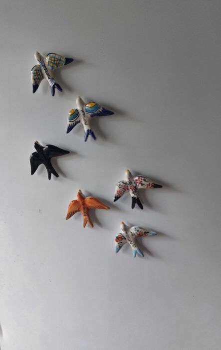 Andorinhas em cerâmica