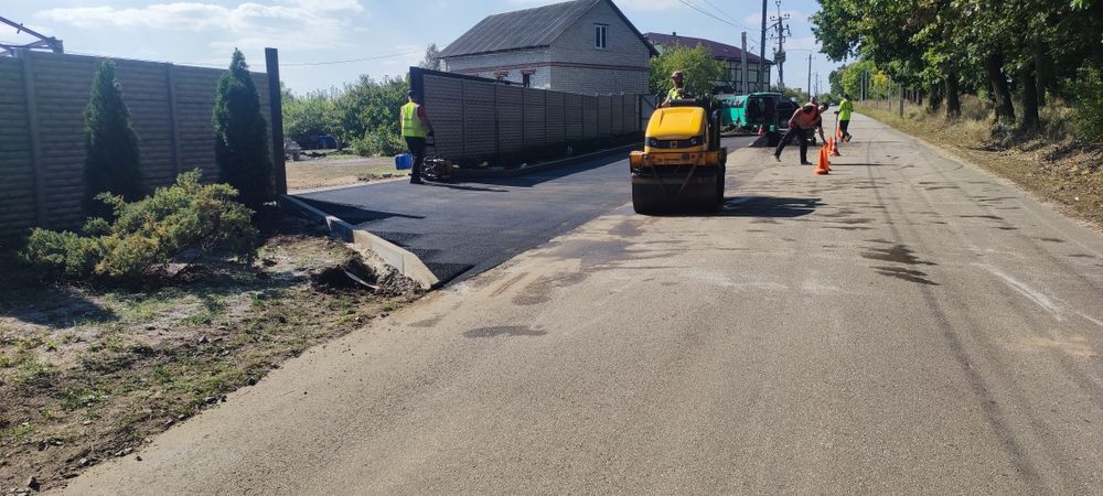 Асфальтирование и укладка асфальтной крошки.
