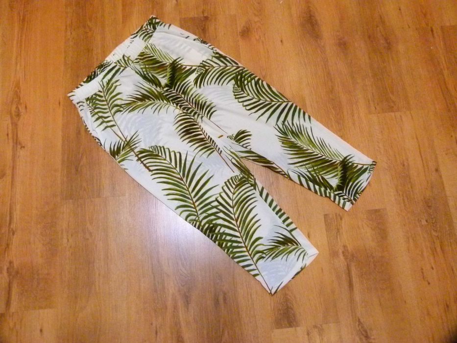 H&M spodnie cienki lejący materiał białe w liście dł 4/5 rozm 42 XL