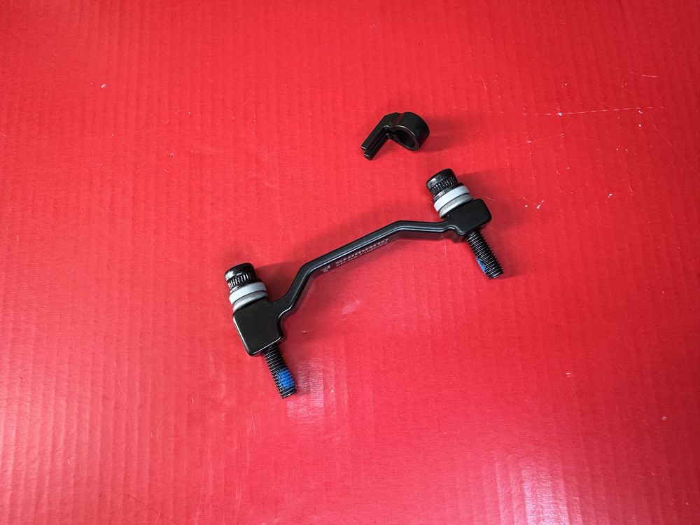 Adapter hamulca tarczowego SHIMANO SM-MA-F180