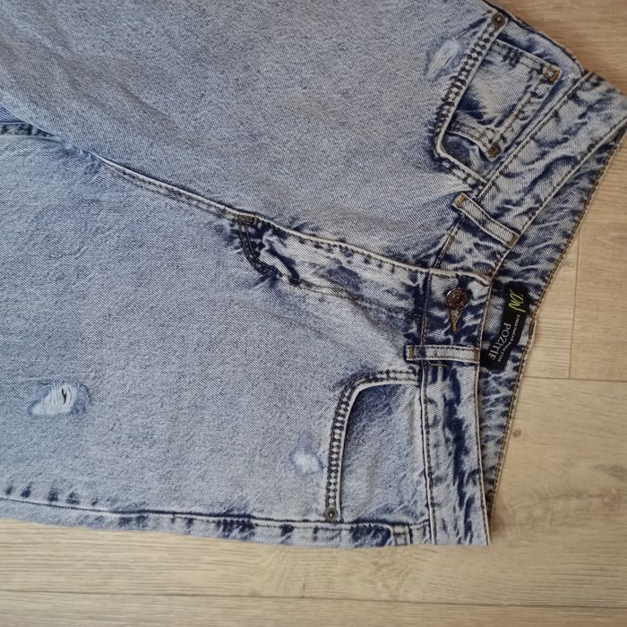 Джинсы трубы рваные