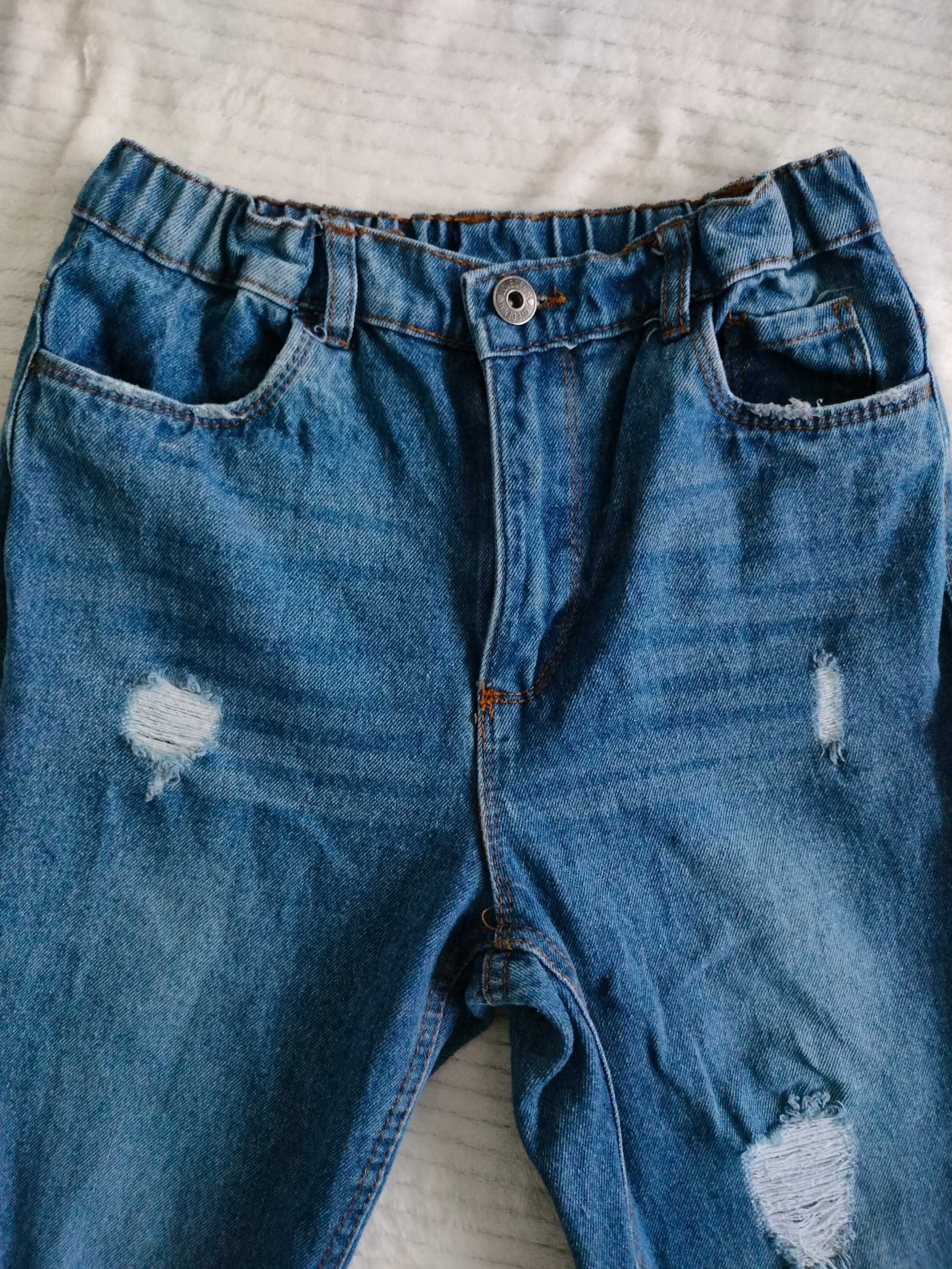 Spodnie jeansowe z przetarciami dla dziewczynki rozmiar 146